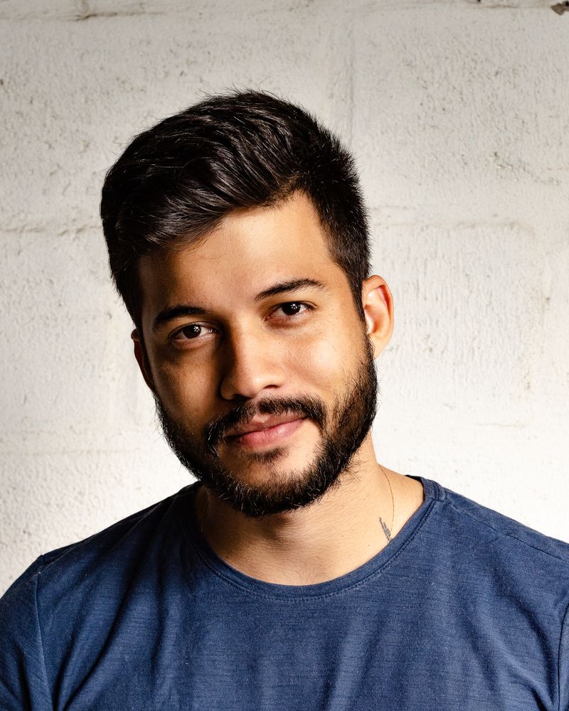 Illustrative stock portrait for sample profile — not a photograph of Ahsan Malik